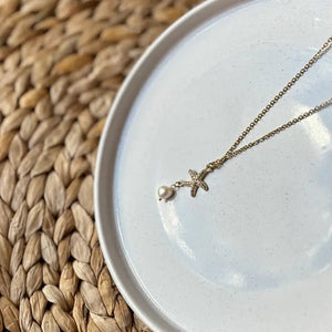 ASTEROIDEA - collana con ciondolo stella marina in zirconi e perla - OE!